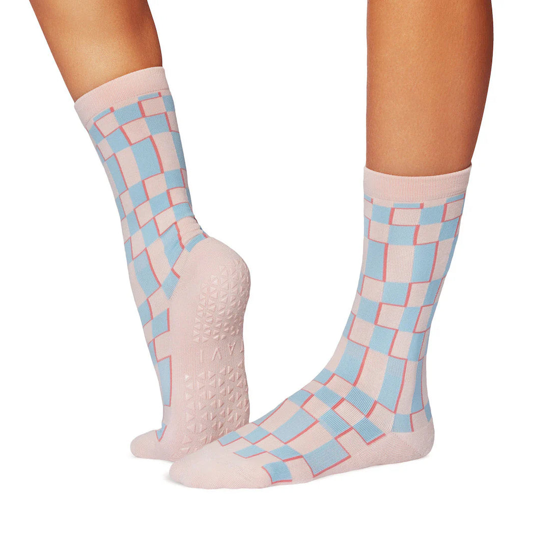 Checkered patterned socks with textured sole on a white background